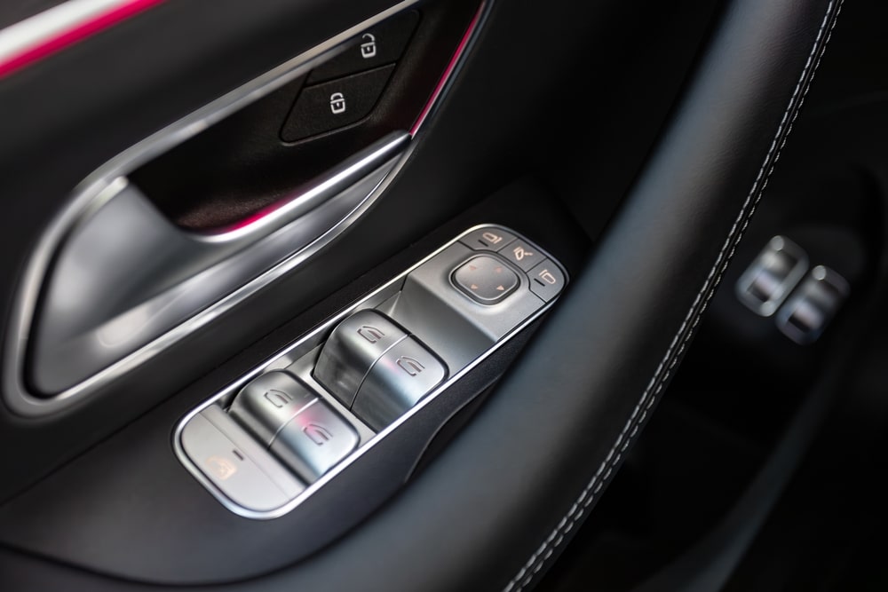 How Do I Diagnose and Fix a Malfunctioning Power Window or Door Lock in My Mercedes?